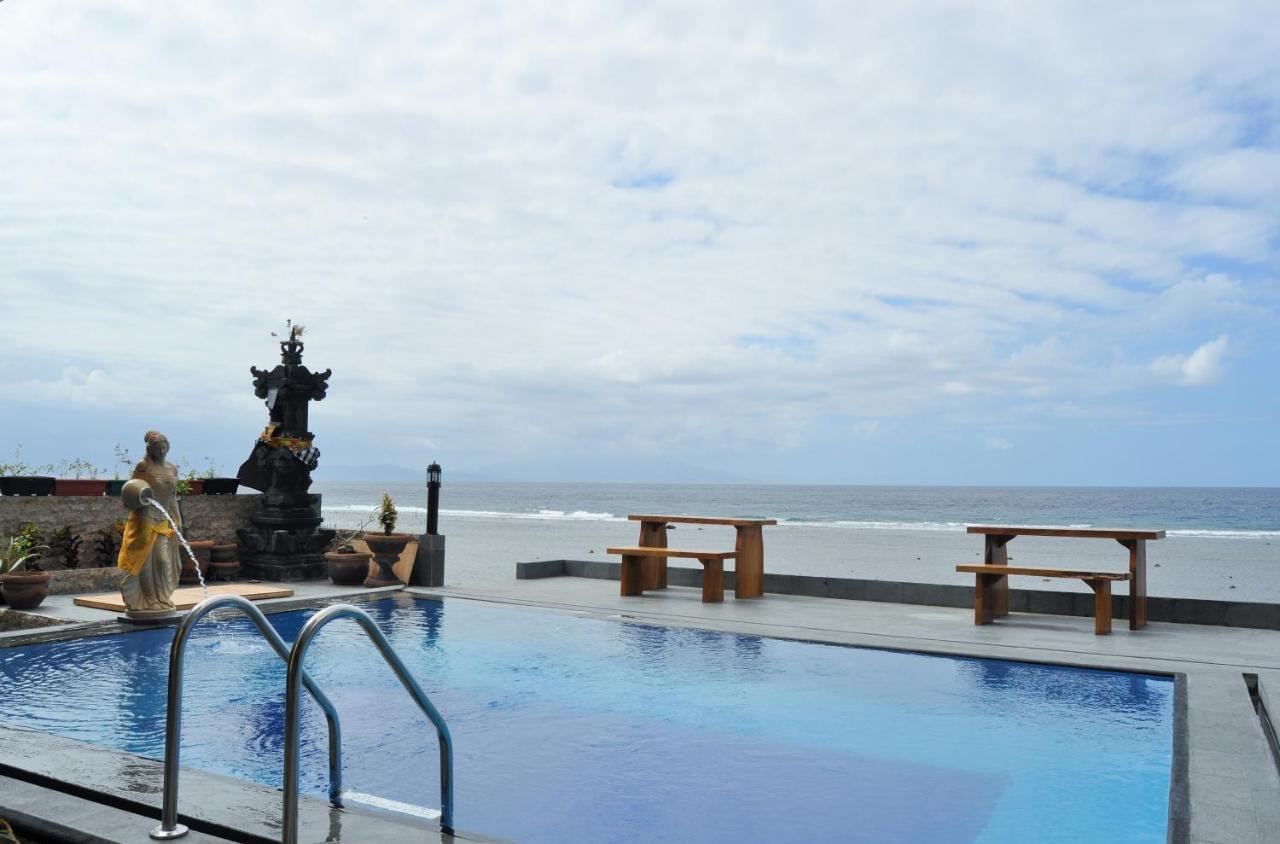 Pradana Beach Inn Luxury Batununggul ภายนอก รูปภาพ