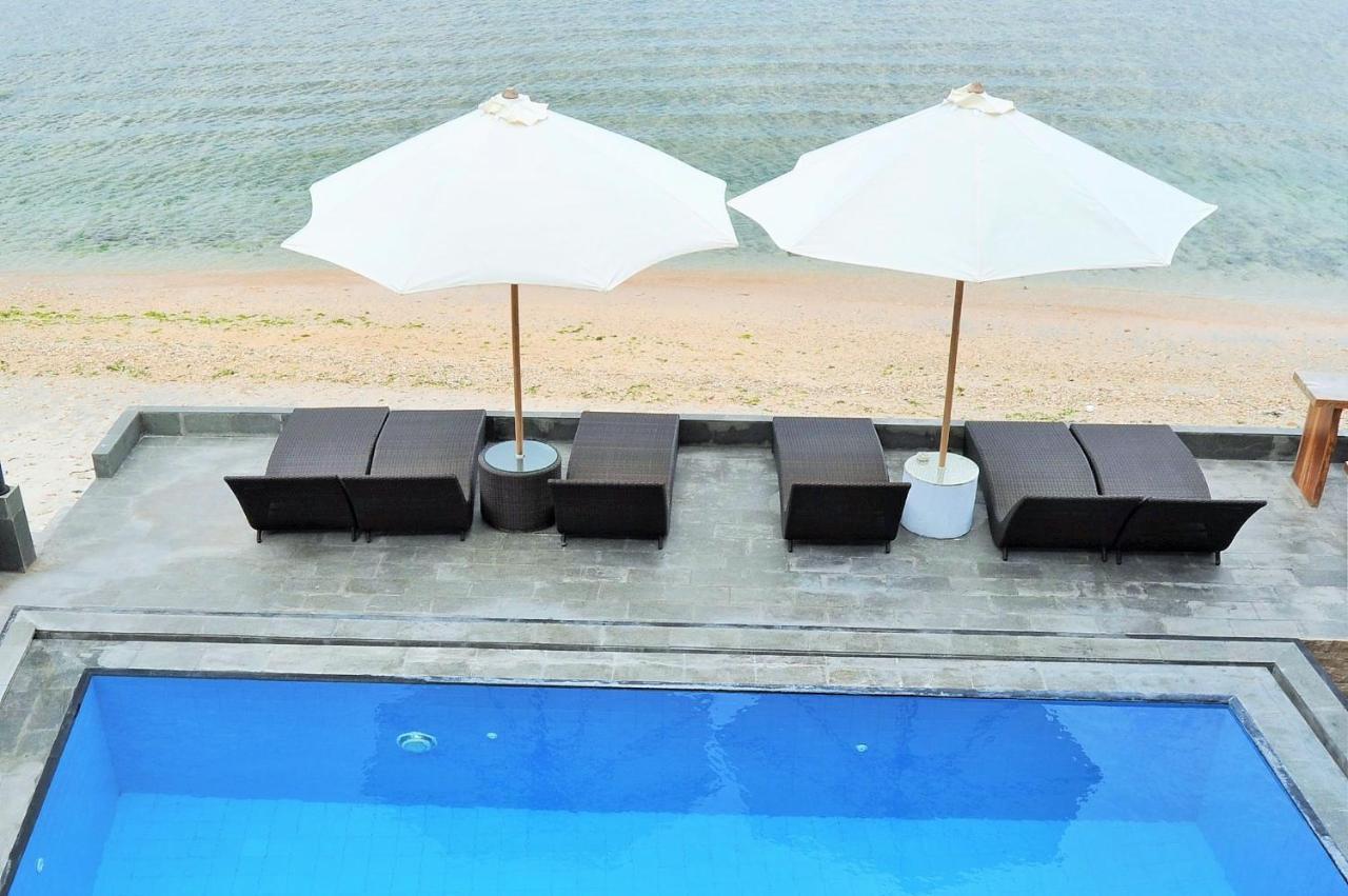 Pradana Beach Inn Luxury Batununggul ภายนอก รูปภาพ